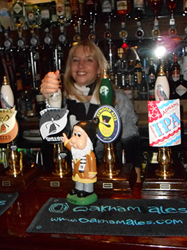 Lisa from McMenemy's celebrates the launch of Bateman's Black and White with the Gaffer. (Dad Lee Pearce had been reported to be at home with headphones, following events).