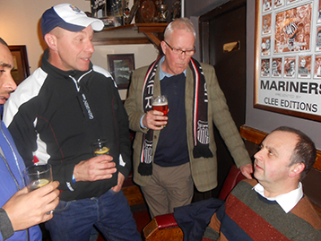 Wes, Steve and Brian explain many of the more intricate details of the Histon 			Mariners campaign to Martin Bennett from New Waltham.