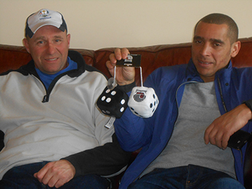 Together with Wes they proudly display their memento's and trophies - the famous Ebony & Ivory dice.