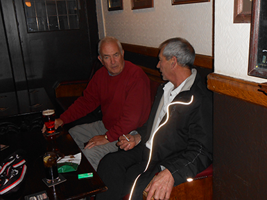 The President and Chairman review the days proceedings over a diet pepsi.