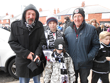 Sophie in total disgust with John's hat - clearly in Scunthorpe colours