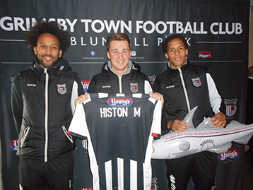 Callum Bostock was anxious to join Josh, Marcus and Harry H to celebrate the Histon Mariners.